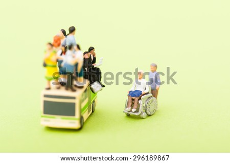 Crowded buses and wheelchair senior
