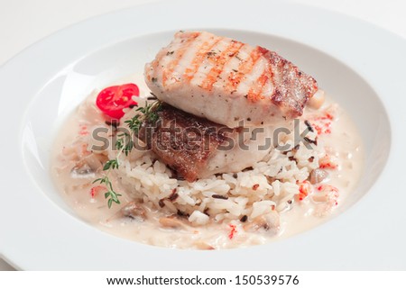 rice with sauce and meat and fish
