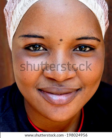 GULU, UGANDA, AFRICA - CIRCA MAY 2009: Portrait of a woman from Uganda, Africa circa May 2009. In Uganda, women\'s roles within the community are slowly improving with increased educational programs.