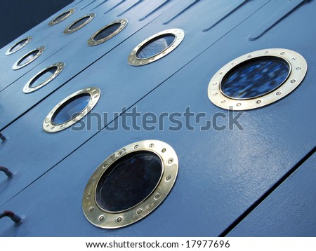 Row of ship porthole in the deck