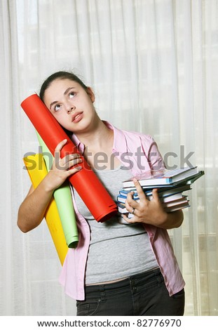 Girl with books and rolls
