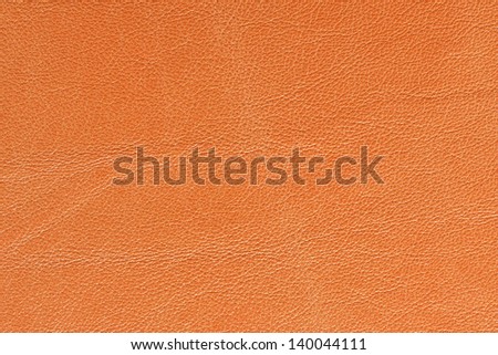 Orange leather texture background (genuine leather)