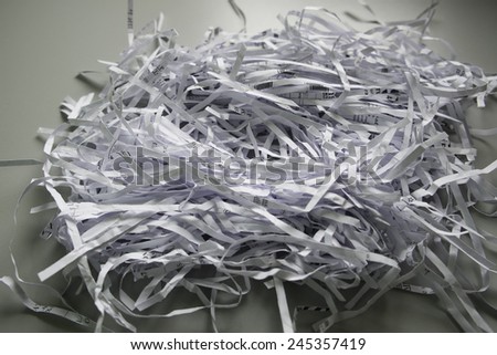 Shredded paper with grey background