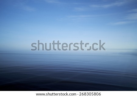 An abstract ocean seascape with blurred panning motion.