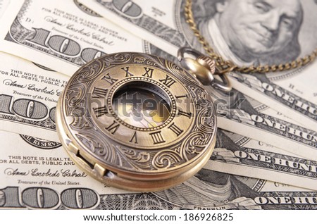pocket watch on the money