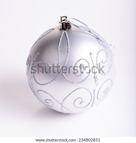 beautiful Christmas silver ball on a white background