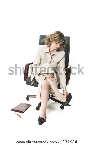 business woman leg fatigue over white