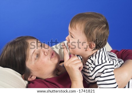 mother calming down her baby