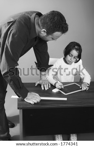 black and white classroom with teacher