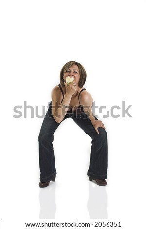 woman eating an apple over white background