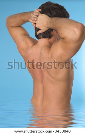 close up of a young man back over blue background