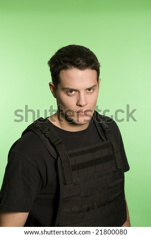 fbi agent standing over green screen with a bullet proofed  jacket