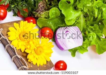 Food journal and  lettuce salad , onion and tomatoes