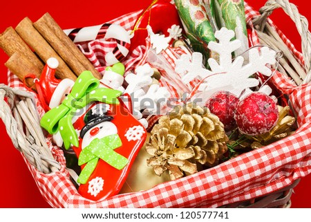 Christmas preparation basket. Basket  with ribbons and christmas tags