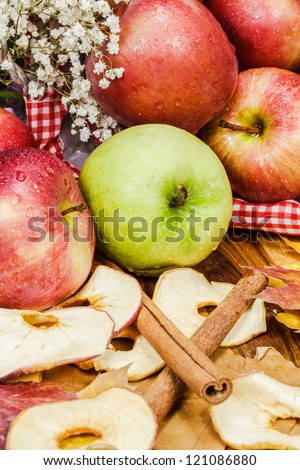 Fresh apples and dried apple slices
