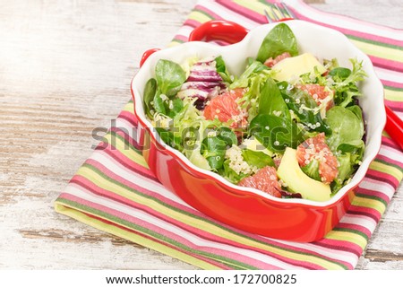 Salad. Spinach and quinoa salad with grapefruit and avocado. Macro, close up
