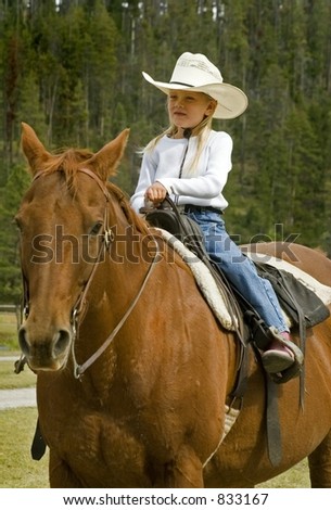 Little Cowgirl on Her Horse - Focus on Girl