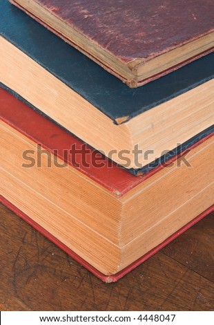Old Book Stack on Schooldesk - Red, blue, purple