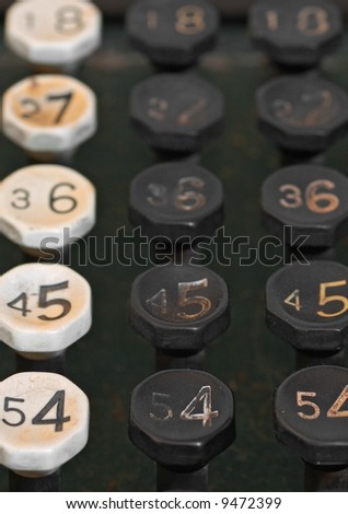 Old Adding Machine Keys - close up of keys on old-time adding machine