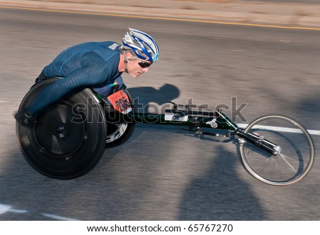 MINNEAPOLIS, MN - OCTOBER 3: Grant Berthlaume powers through Mile 19 and goes on to finish 6th in the Wheelchair Division of the 2010 Medtronic Twin Cities Marathon, October 3, 2010 in Minneapolis, MN