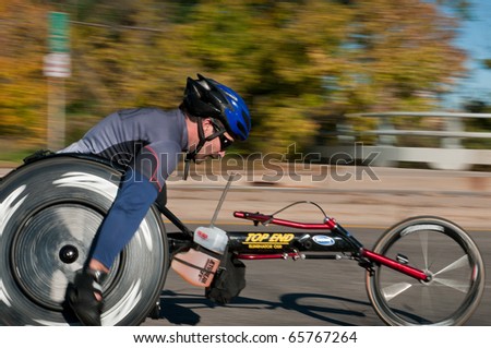 MINNEAPOLIS, MN - OCTOBER 3: Sam Tebaka speeds past at Mile 19 and goes on to finish 9th in the Men\'s Wheelchair Division of the 2010 Medtronic Twin Cities Marathon, October 3, 2010 in Minneapolis, MN