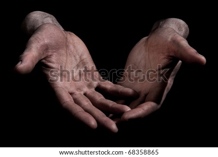 Dirty Outstretched Hands - Open Fingers Dirty outstretched male hands against black background - one hand laid on top of the other - open fingers