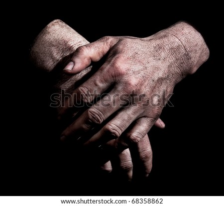Dirty Hands - Dirty male hands against black background