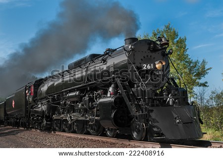 BROOK PARK, MN - SEPTEMBER 27: Fall colors excursion of the Milwaukee Road #261 Steam Engine from Minneapolis, MN to Duluth, MN. Closeup of engine as it passes on September 27 2014 near Brook Park MN