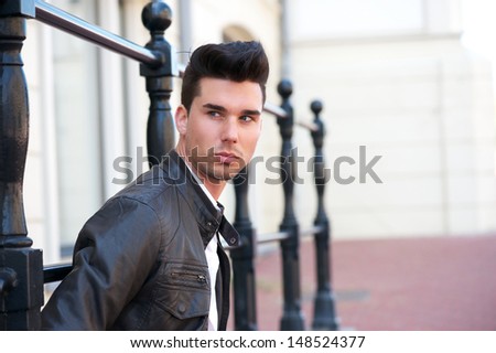 Closeup portrait of an attractive male fashion model