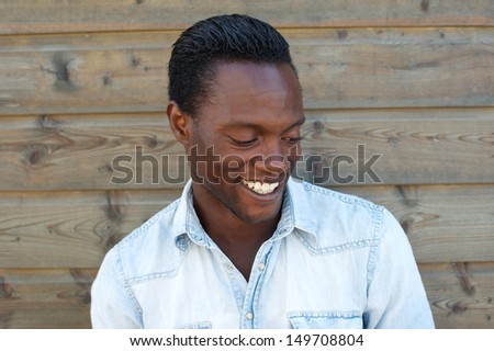 Closeup portrait of a cheerful african american man laughing