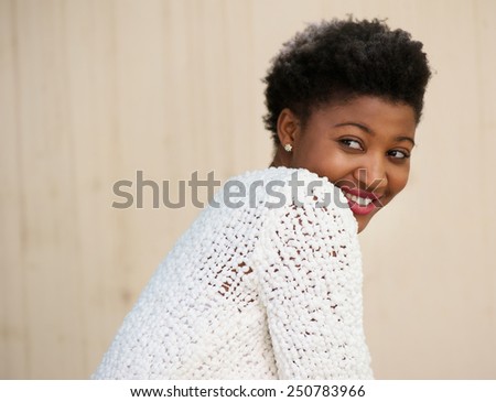 Close up side portrait of a cute young african american woman