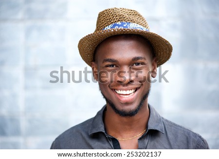Close up portrait of a happy african american man laughing