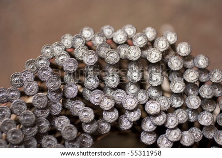 stock photo : Top view of nail head from a nail gun. Save to a lightbox ▼