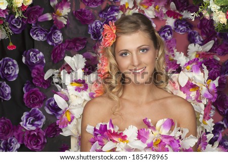 Flower Fairy. Portrait of a beautiful girl with a flower in her hair