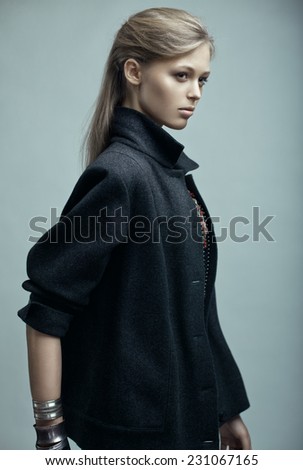 Fashion portrait of a beautiful blonde model with long straight hair