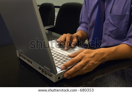 At Work With The Computer - Close-up of a man\'s hands scrolling the \