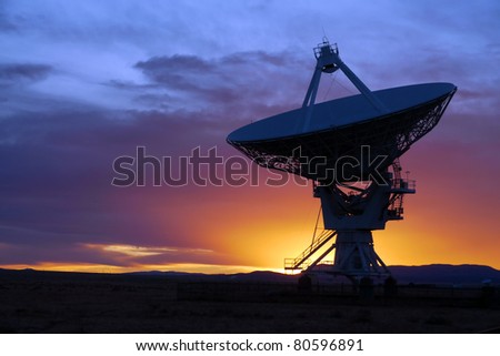 Silhouette of a radio telescope at the Very Large Array VLA in New Mexico USA at sunset Silhouette of a radio telescope at the Very Large Array VLA in New Mexico USA at sunset