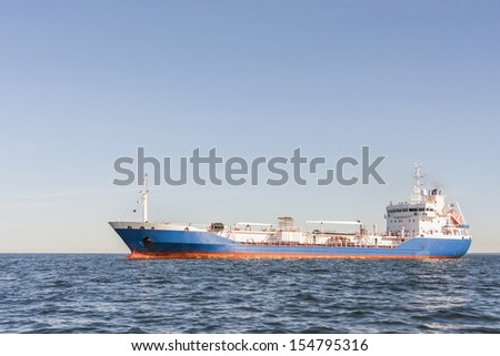 Commercial chemical or gas tanker or anchored in sea