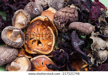 Heap of dried  balefruit,dried shiitake mushroom,dried black fungus and dried roselle