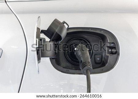 Nonthburi,Thailand - March 26th, 2015: Charging dock with Porsche universal charger (AC) is like a private filling station,showed in Thailand the 36th Bangkok International Motor Show on 26 March 2015