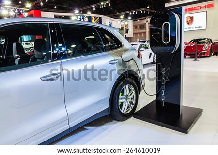Nonthburi,Thailand - March 26th, 2015: Charging dock with Porsche universal charger (AC) is like a private filling station,showed in Thailand the 36th Bangkok International Motor Show on 26 March 2015