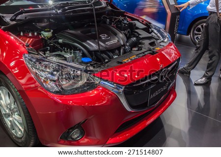 Nonthaburi,Thailand - March 26th, 2015: Engine of all New Mazda2 Sedan on display ,showed in Thailand the 36th Bangkok International Motor Show on 26 March 2015