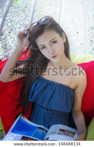young sexy female relax outdoor navy dress