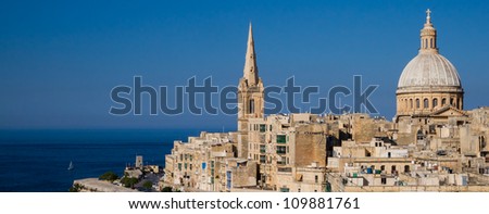 Panoramic view over Maltas capital Valletta against the blue sky and deep blue sea