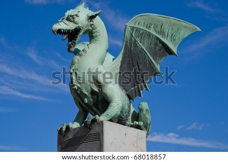 A statue at the dragon bridge across the Ljubljanica River in Slovenias capital Ljubljana