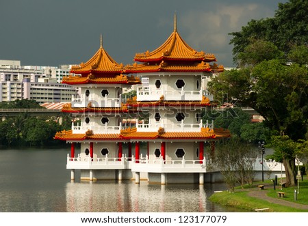 The Twin Pagoda at the Chinese Garden of Singapore against a cloudy sky