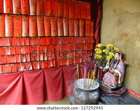 Display of prayer notes and burning incense, A-Ma temple, Macau