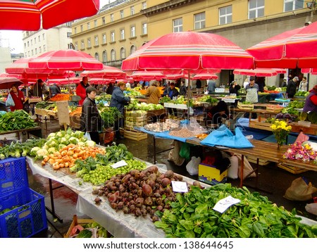 ZAGREB, CROATIA - NOVEMBER 8: Unidentified people shop for fruits and vegetables at Dolac Market on November 8, 2010 in Zagreb, Croatia. Dolac is the largest farmer\'s market in Zagreb.