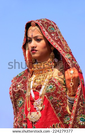JAISALMER, INDIA - FEBRUARY 16: Unidentified woman takes part in Desert Festival on February 16, 2011 in Jaisalmer, India. Main purpose of this Festival is to display colorful culture of Rajasthan