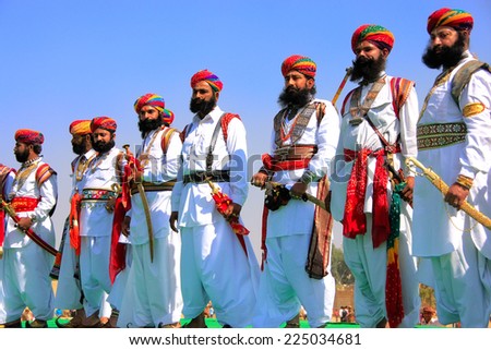 JAISALMER, INDIA - FEBRUARY 16: Unidentified men take part in Mr Desert competition on February 16, 2011 in Jaisalmer, India. Main purpose of this Festival is to display colorful culture of Rajasthan